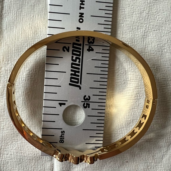 Gold-Tone Hinged Bracelet with Enamel and White Flower Accent - Picture 3 of 5